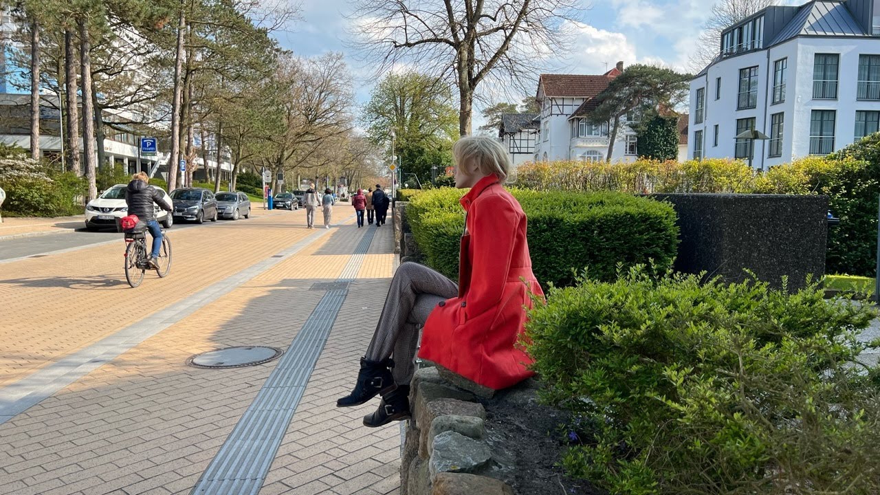 Walking by Sunny Beach Timmendorfer Strand Germany April 2023