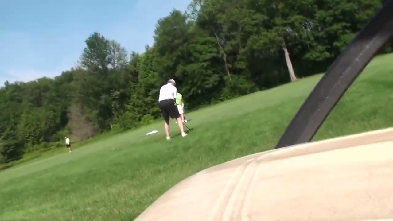 Mark  Mac & Champ  Mac Dumps it in the water on 2 at Elmhurst Country Club