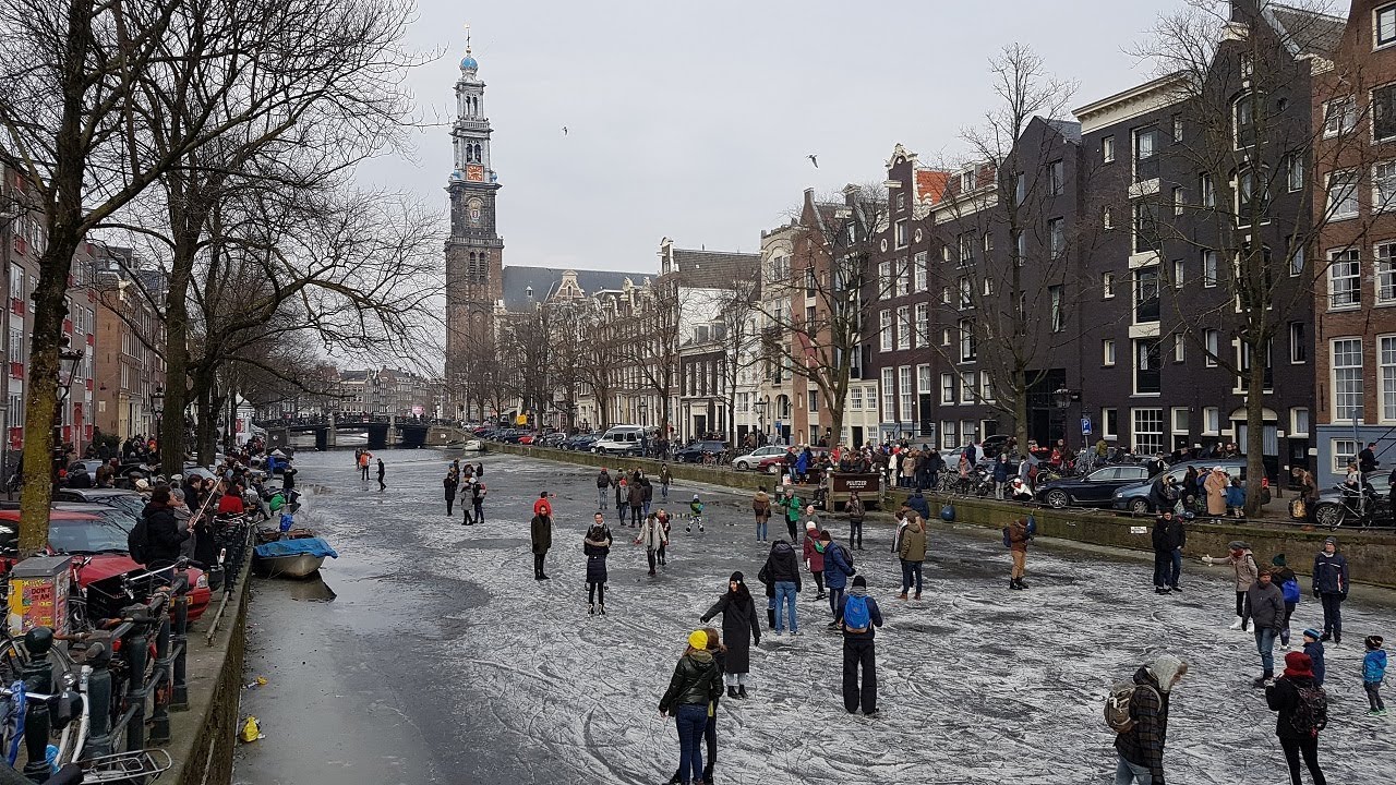 Ice skating on frozen canals in Amsterdam, Winter 2018