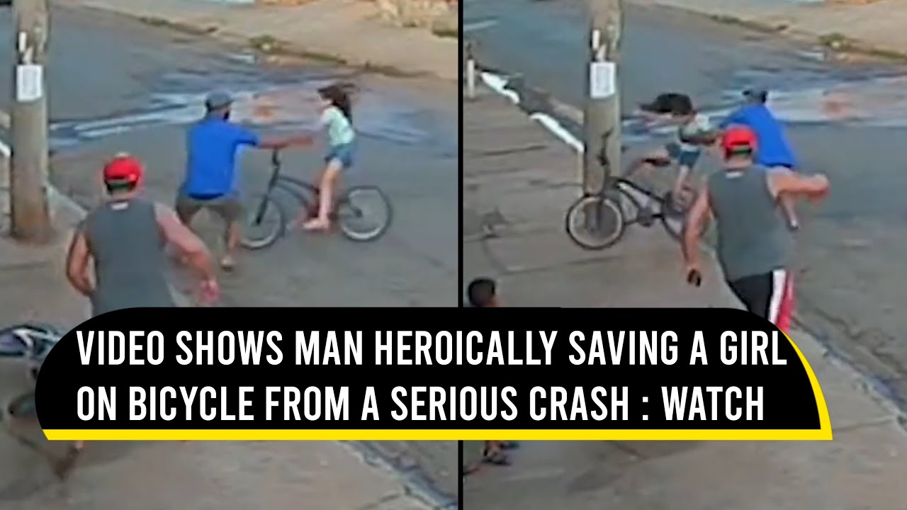 Viral video shows man heroically saving a little girl on a bicycle from a serious crash