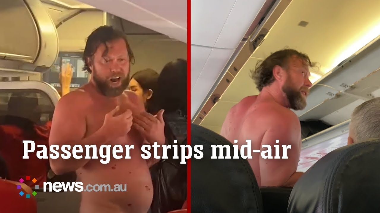 Drunk Russian passenger strips mid-air 'while trying to jump off the plane'