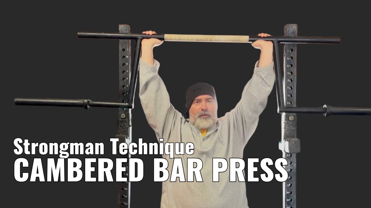 Cambered Bar Overhead Press - Strongman Training Library 