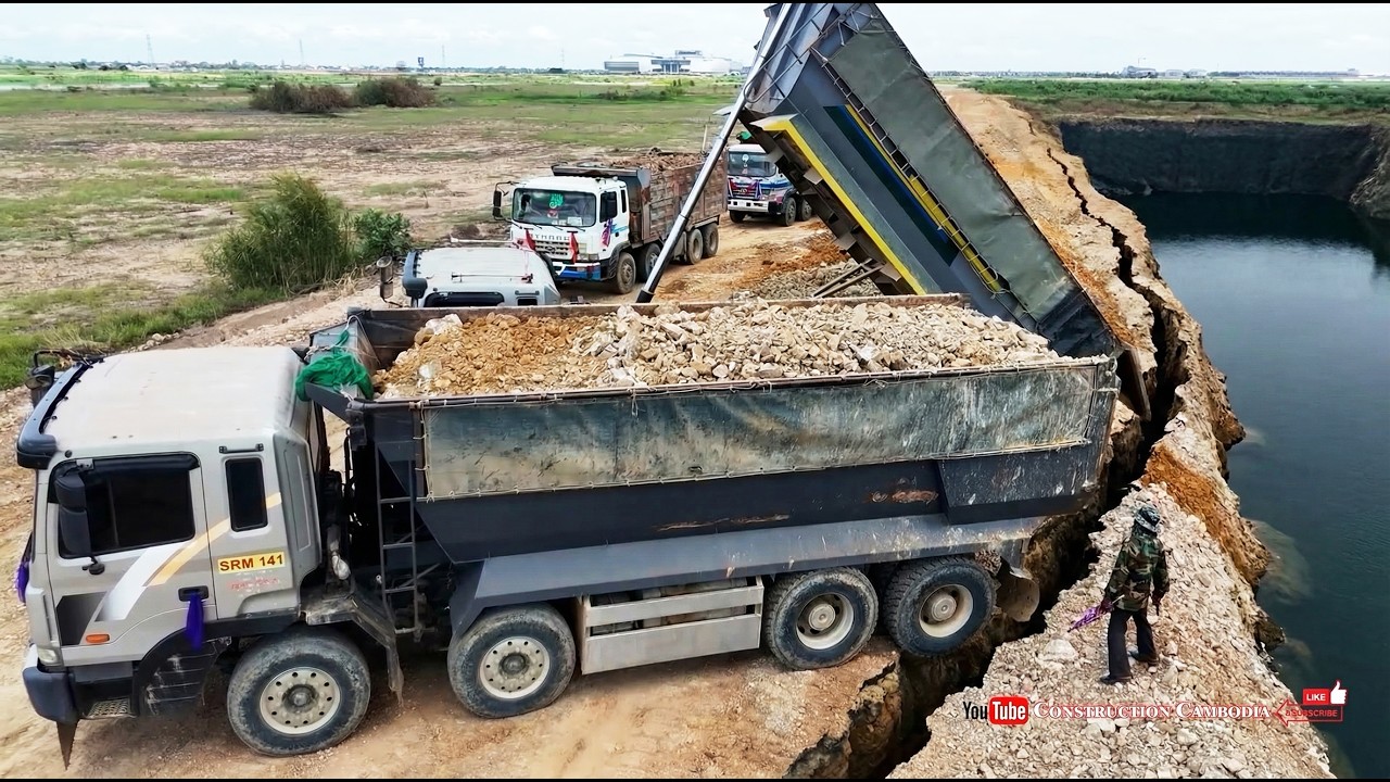 Nicely Landfill In Place On Landslide Complete By Skilled Shantui DH17C3 Dozer & 25 Ton Dump Trucks