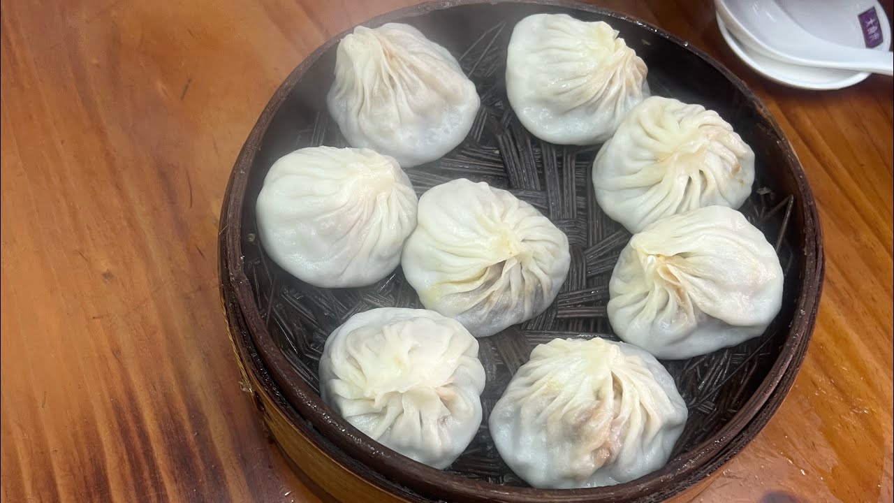 Xiao long bao searching for the best soup dumpling in Shanghai  QIBAO old street