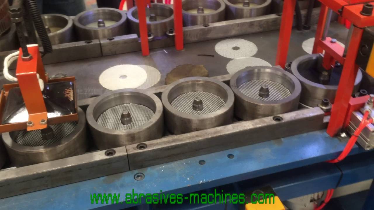 Grinding wheel making machine