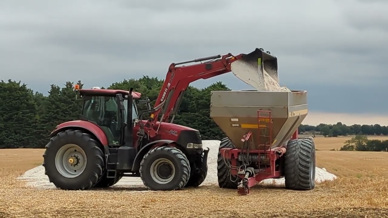 LIME SPREADING WITH A CASE PUMA AND A KRM BREDAL SPREADER