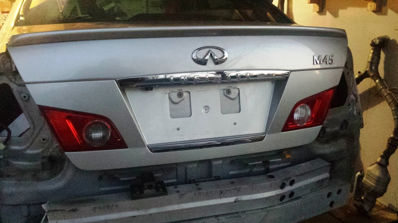 Disassemble trunk finisher to remove inner reverse taillight, camera etc. - M45 M35