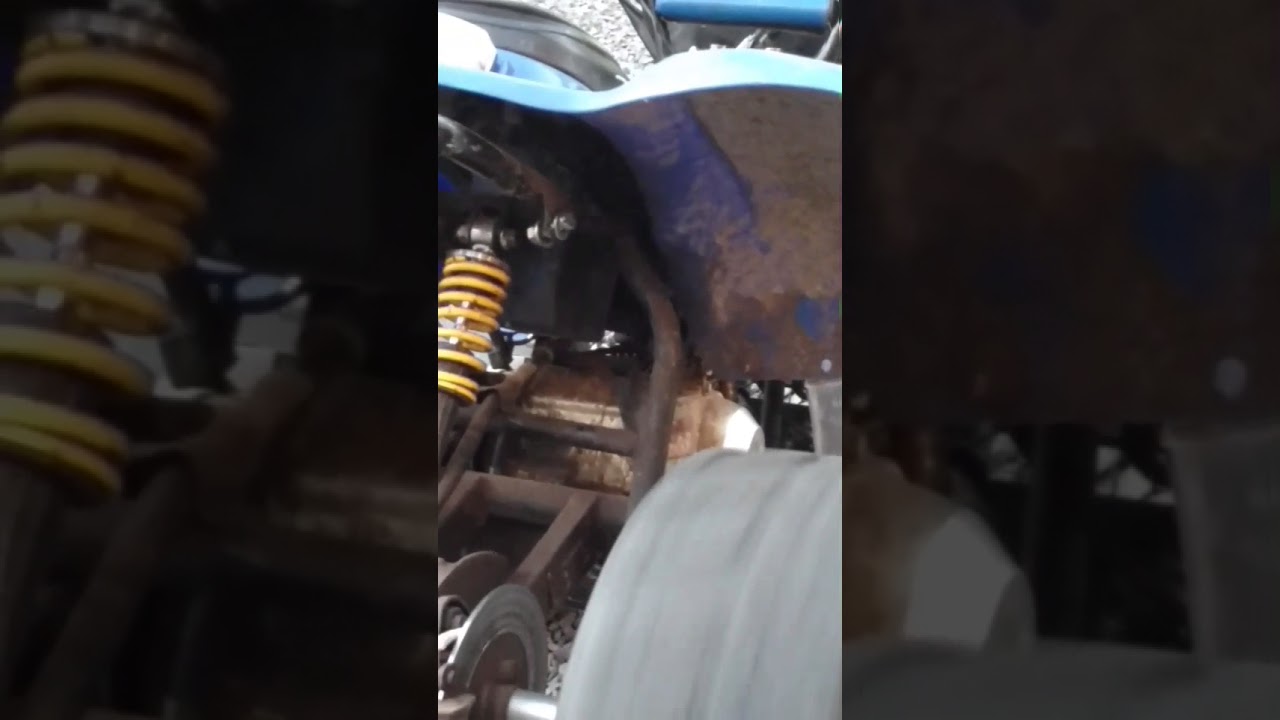 Straight piped 110cc Chinese ATV shoots flames
