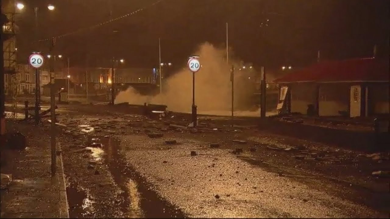Storm leaves concrete slabs scattered across Aberystwyth sea front