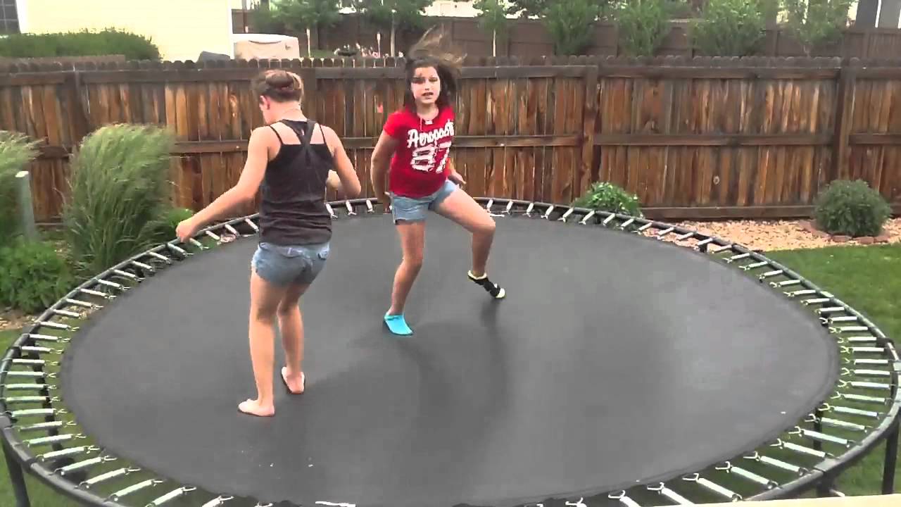 Girls jumping on trampoline