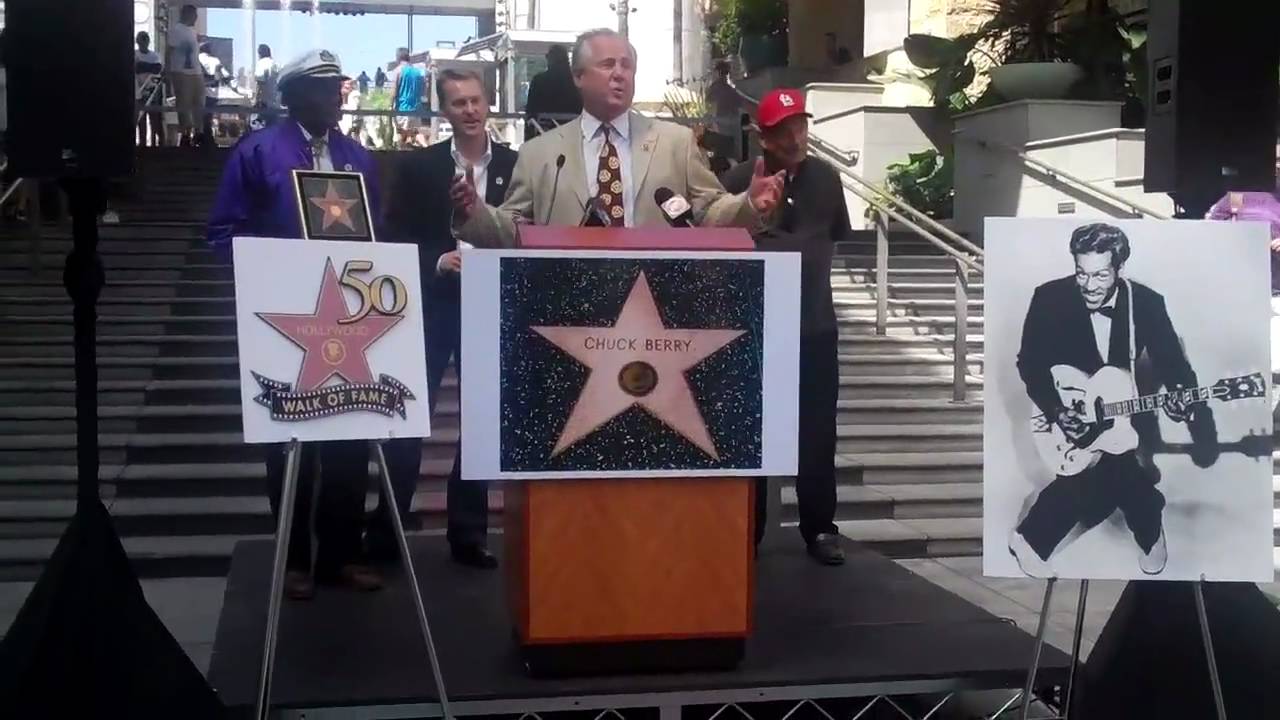 Chuck Berry picks up his Walk of Fame plaque