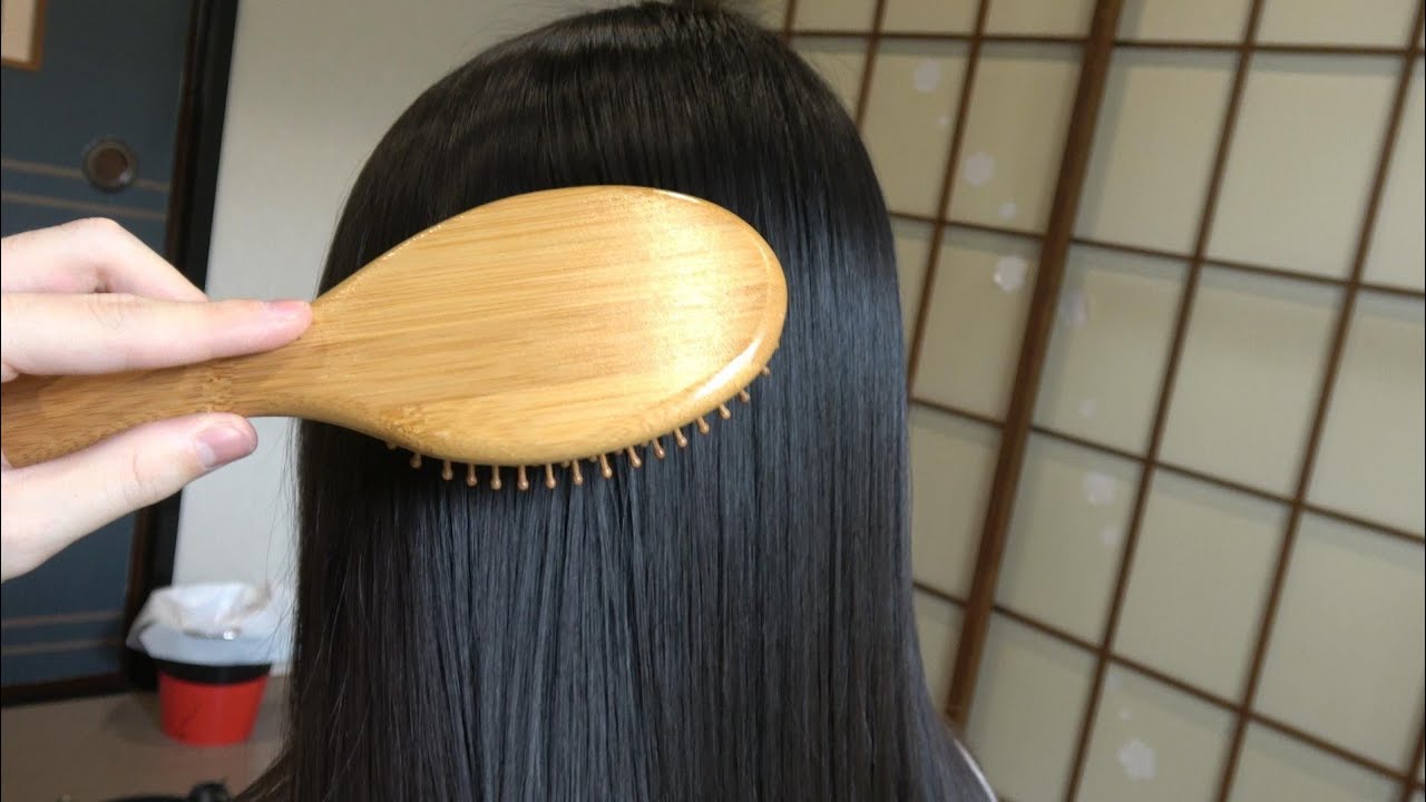 Relaxing black shiny Japanese girl hairplay