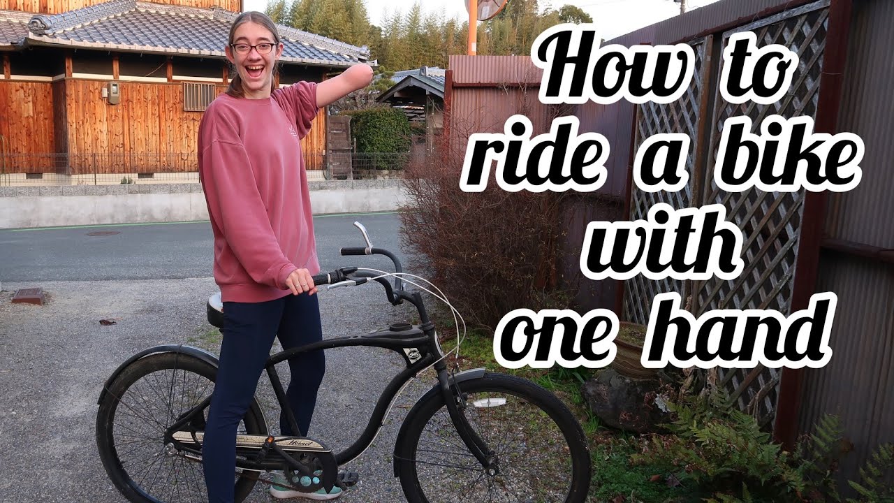 How to ride a bike with one hand