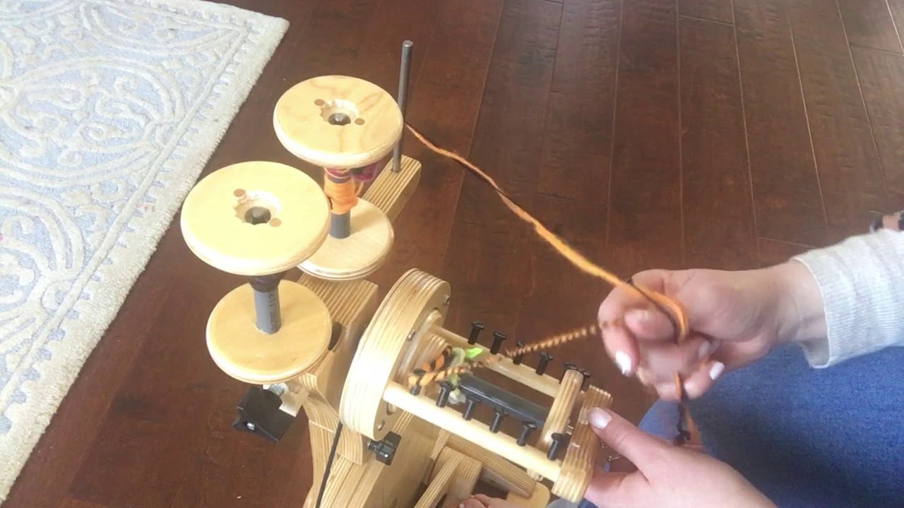 how to ply yarn off a lazy kate on the top- how to ply on spinoluton spinning  wheel
