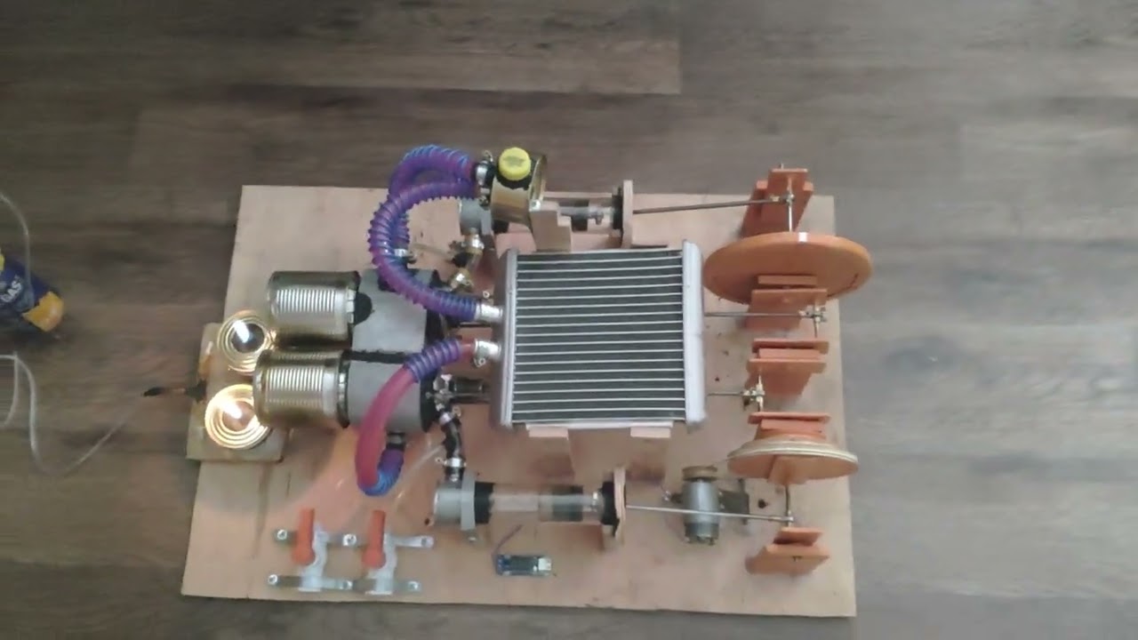 Двигун Стірлінга гама конфігурації, з генератором. Gamma Stirling engine with generator.