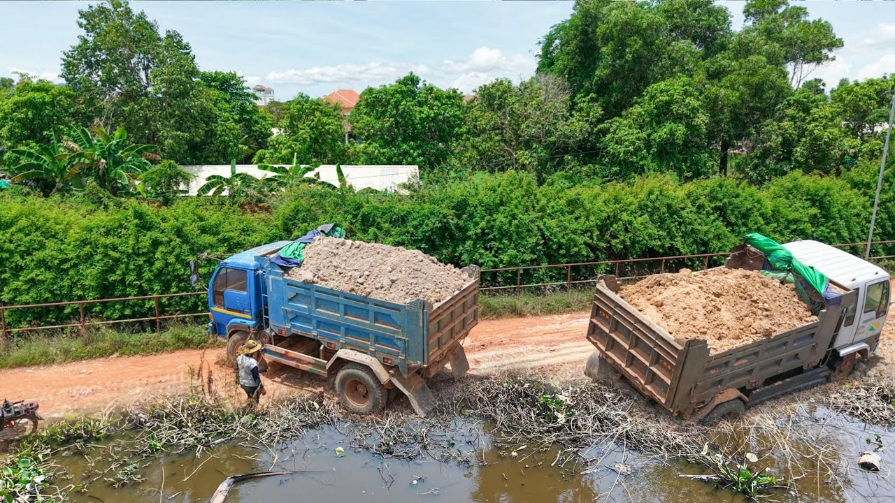 Amazing New journey !!  landfill delete flooded use soil by skill Dozer pushing bury with 5t trucks 