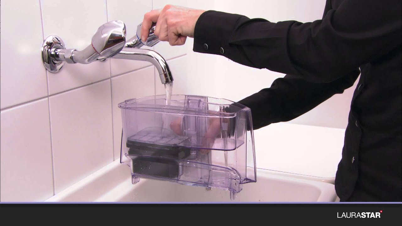 Laurastar - Comment remplir le filtre à eau avec les granulés anticalcaires ?