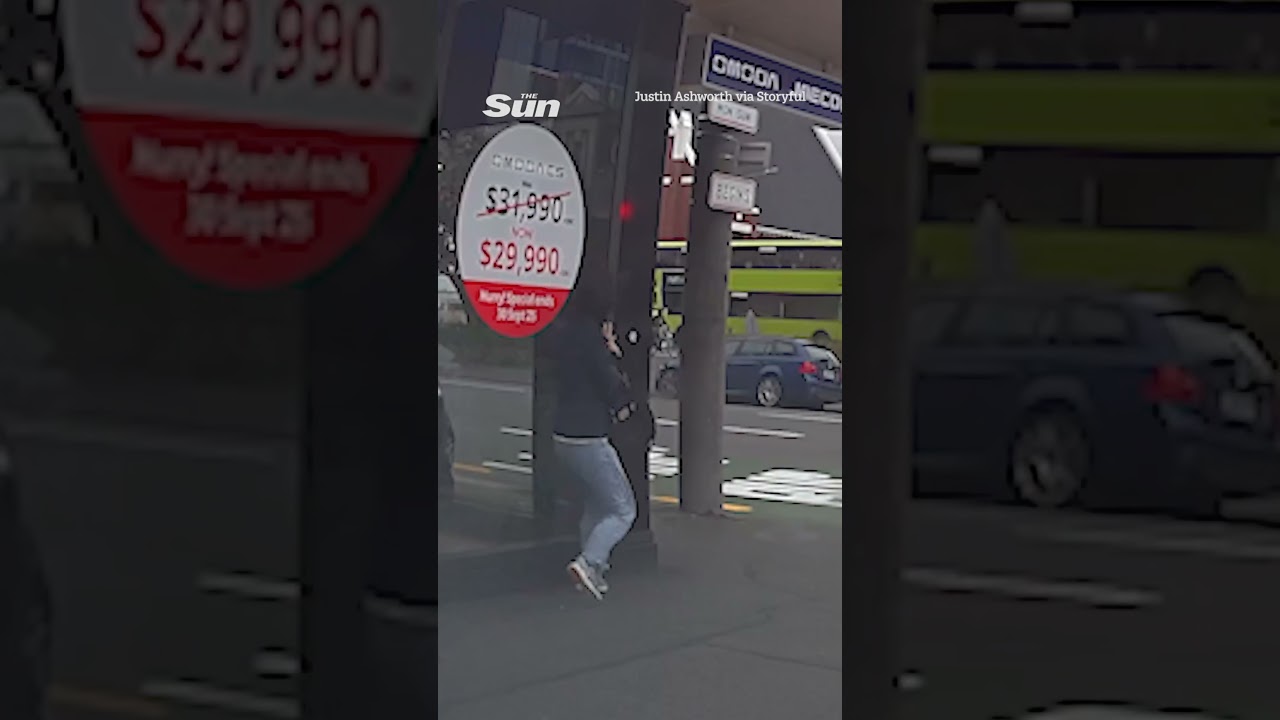 Moment gale force winds throw pedestrian into traffic in close call