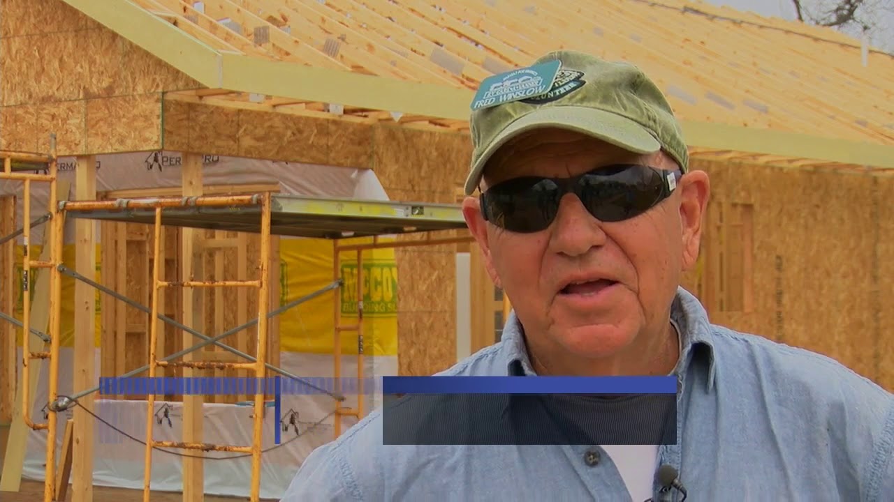 RV Care-A-Vanners help build home