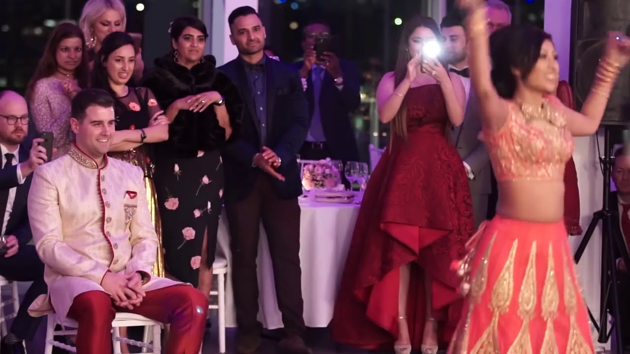 Bride surprises Groom with a beautiful Indian Dance
