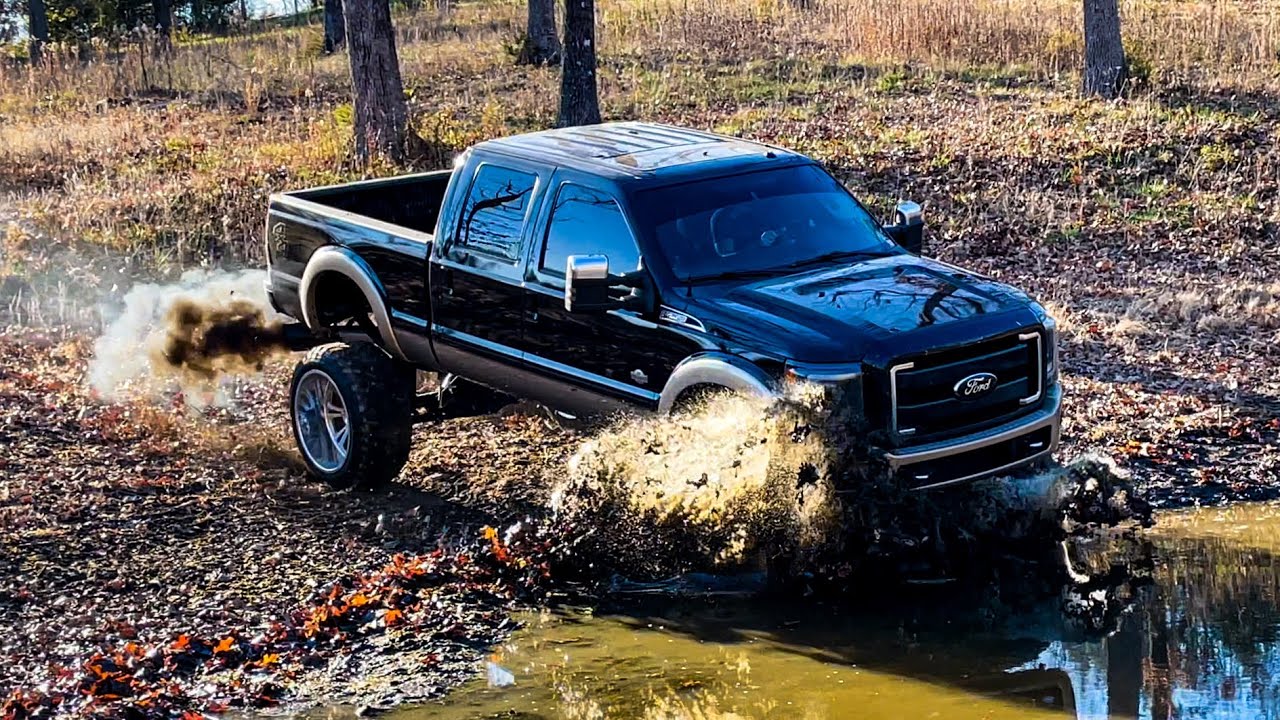 BOOSTED LAUNCHING INTO A POND **MUDDING WITH LIFTED TRUCKS**