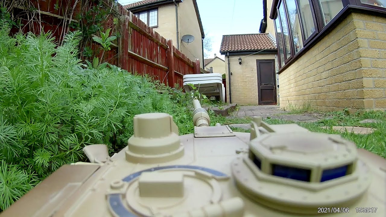 ONBOARD XQ Toys RC M1A2 Abrams Tank 2.4GHz in the garden