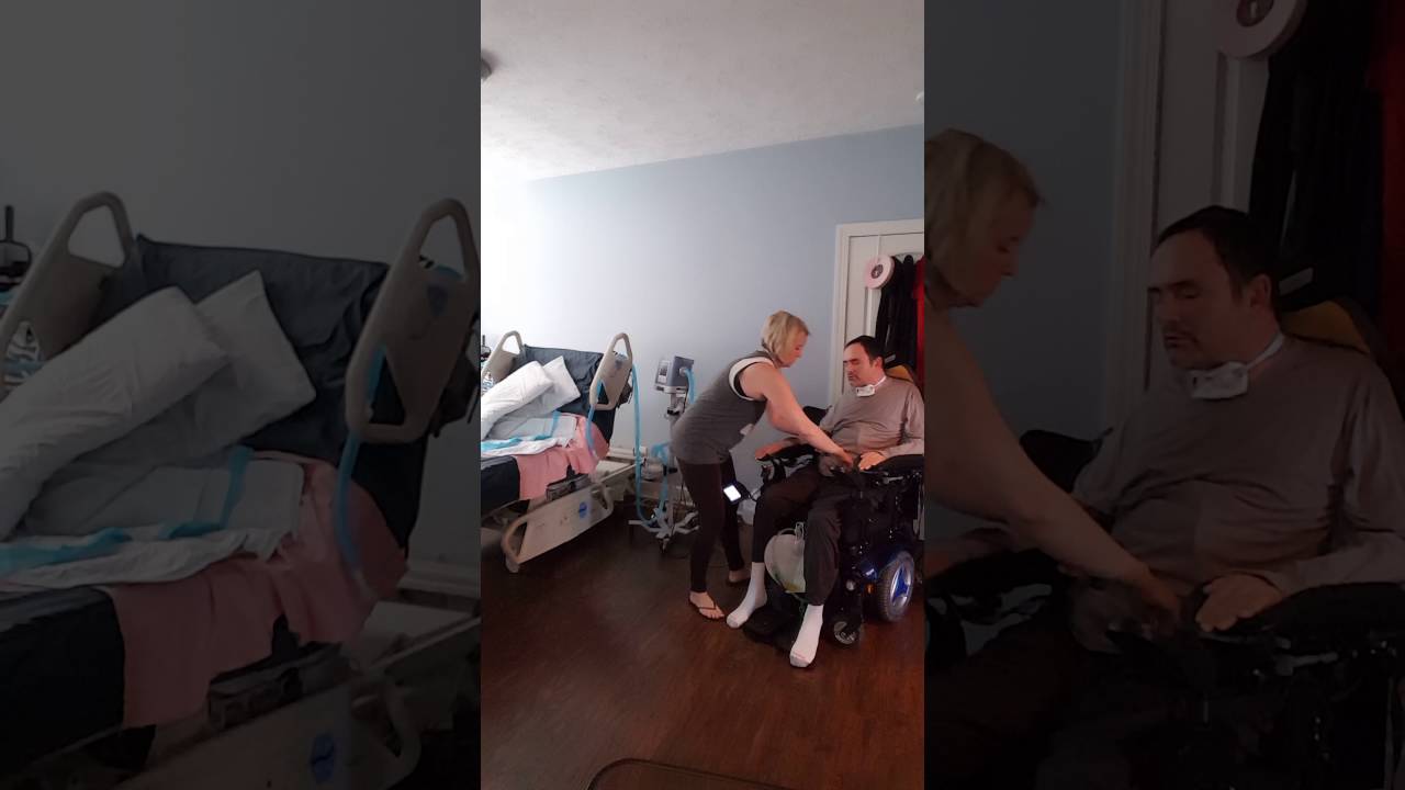 Transferring from bed to powerchair.