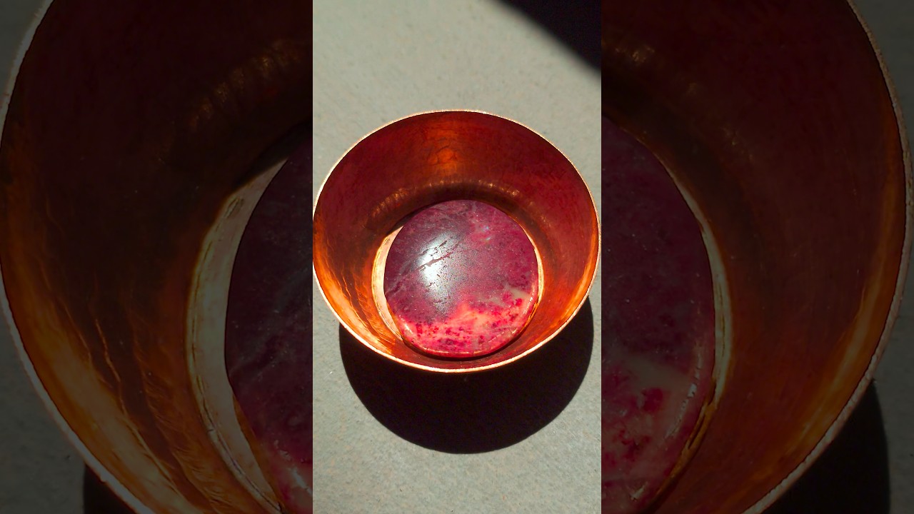 What Makes Thulite Turn Pink In Color?