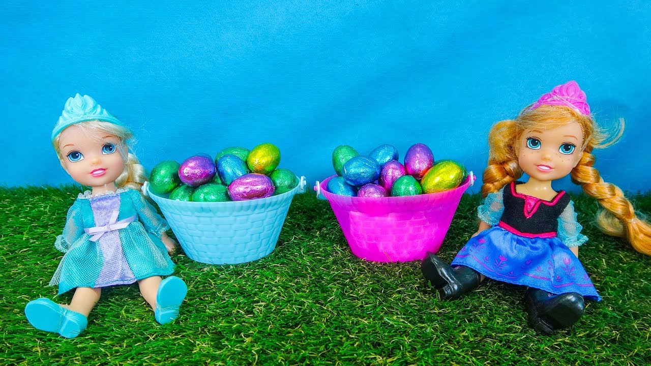 Elsa and Anna toddlers Easter egg hunt with their friends