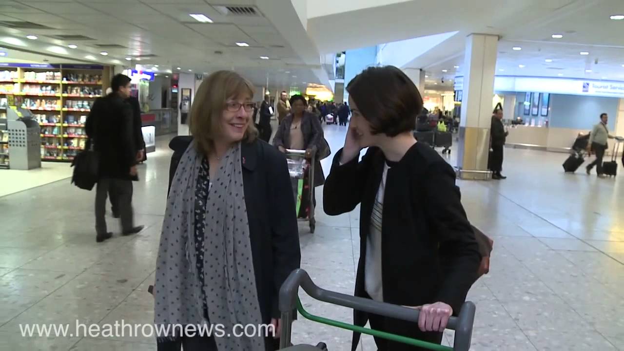 A long way from Downton Abbey as actresses arrive at Heathrow