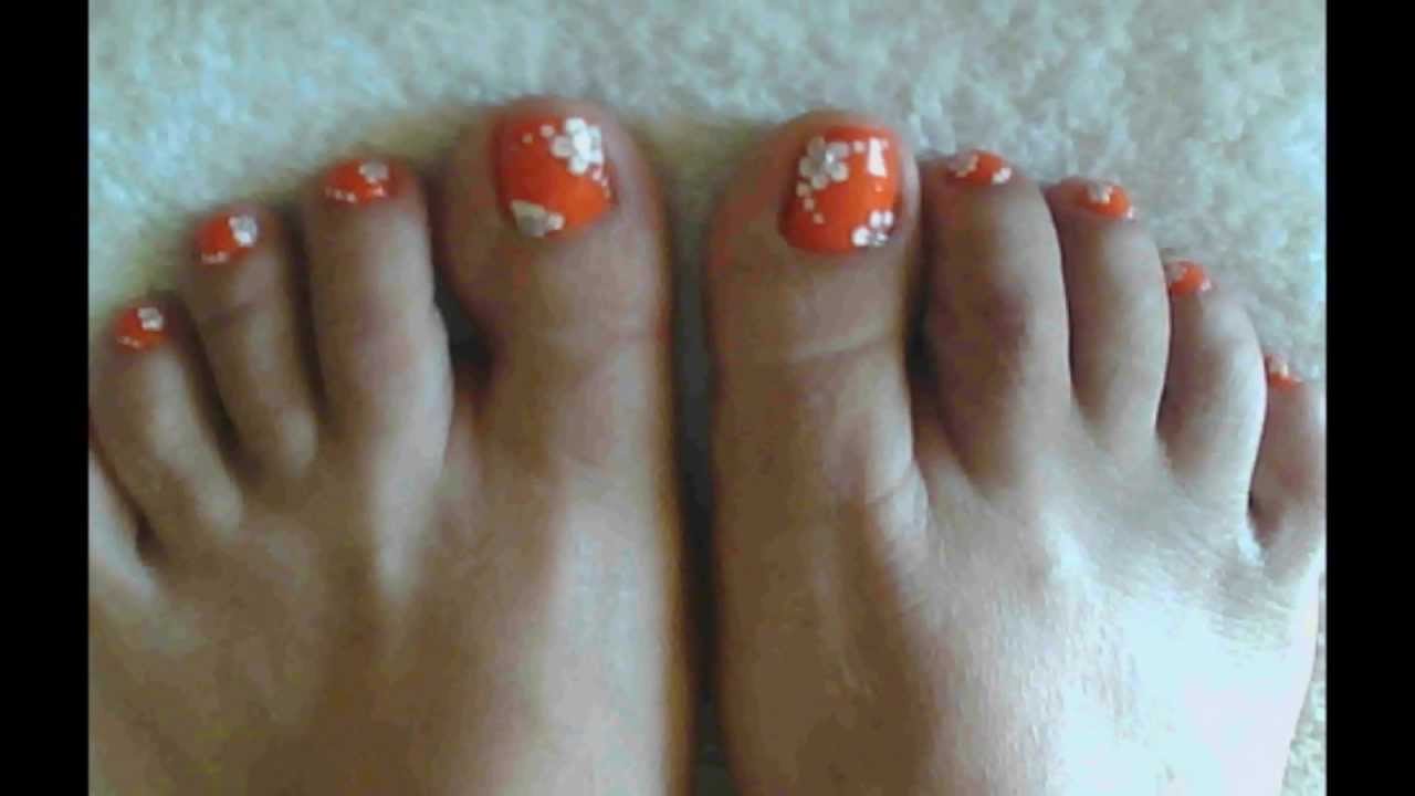 Pretty coral toe nail art design