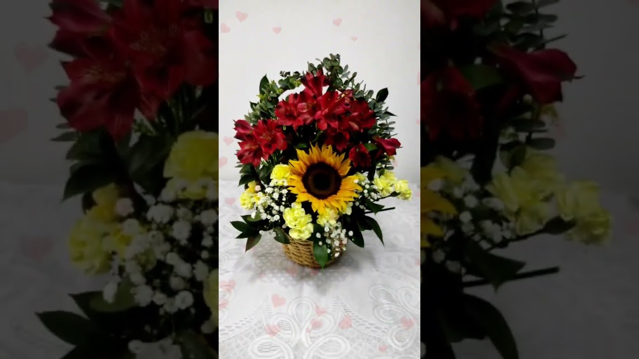 Lest make an arrangement with flowers and sunflower