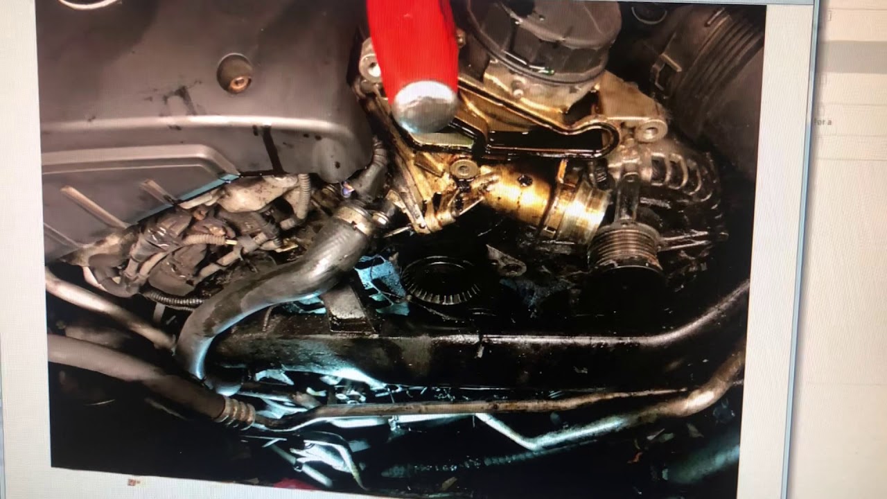 Bmw broken belt oil housing leak