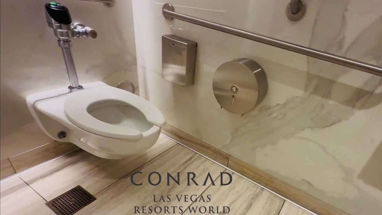 Women’s Restroom Kohler Kingston Toilet Flush | Conrad Hilton at Resorts World, Las Vegas, Nevada 