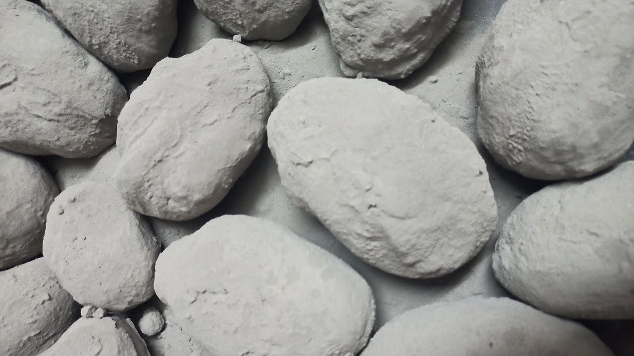 pure cement blocks crumbling in water dipping and dry dusty mixing paste play