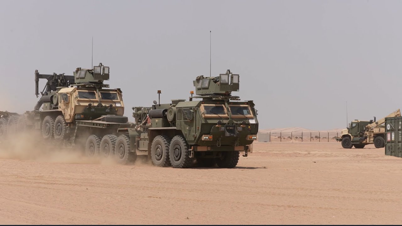 U.S. Marine Corps and U.S. Army Convoy Vehicles Arrive at LSA
