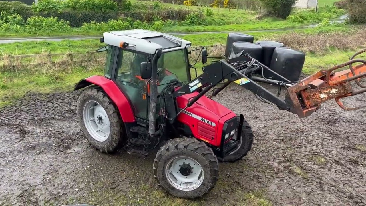 Classic Massey Ferguson 6265 Lifting Round Silage Bales