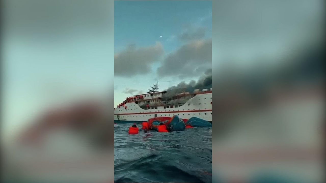 Indonesia ferry catches fire, passengers jump to sea