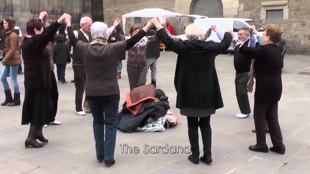 Locals dance the Catalan Sardana outside Barcelona Cathedral