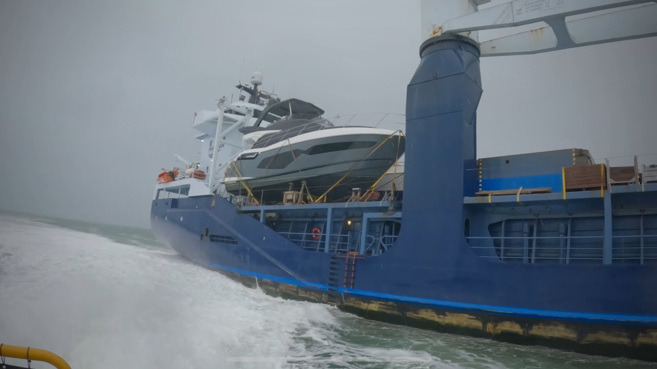 Yacht transport vessel enters the port of Rotterdam 
