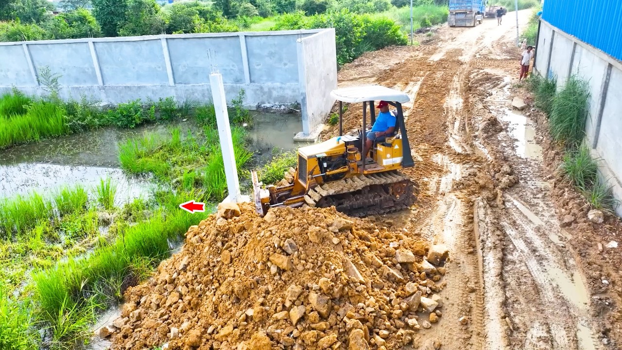 Bulldozer MITSUBISHI BD2F Pushing Soil & Stone Into Water, Dump Truck 5Ton Unloading