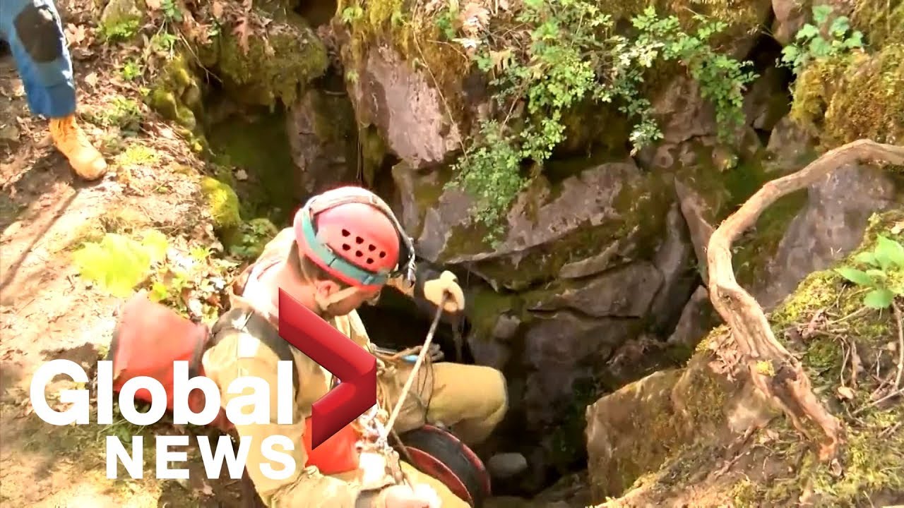 Emergency crews trying to rescue 5 men trapped in cave in Virginia