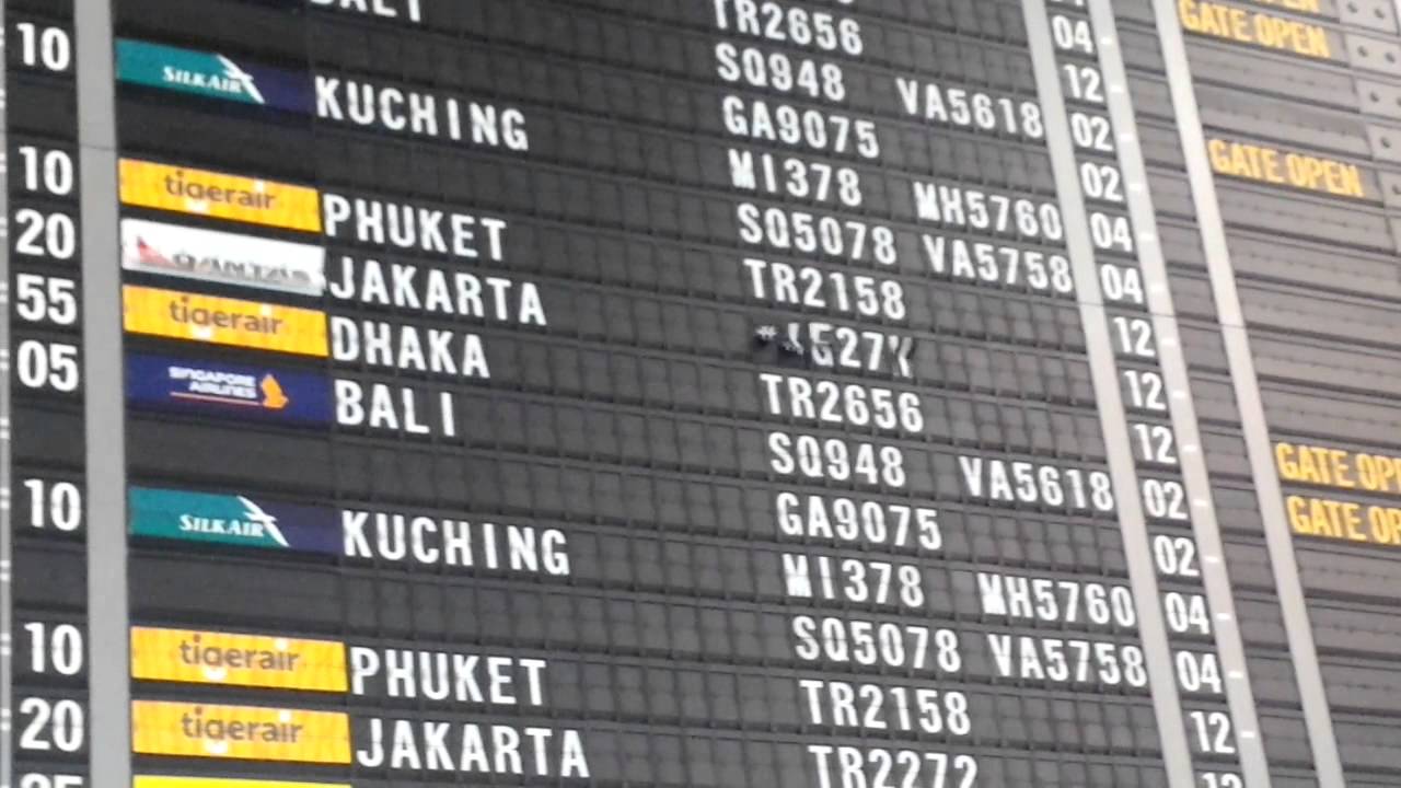 Large flight information board at Singapore Changi Airport Terminal 3.