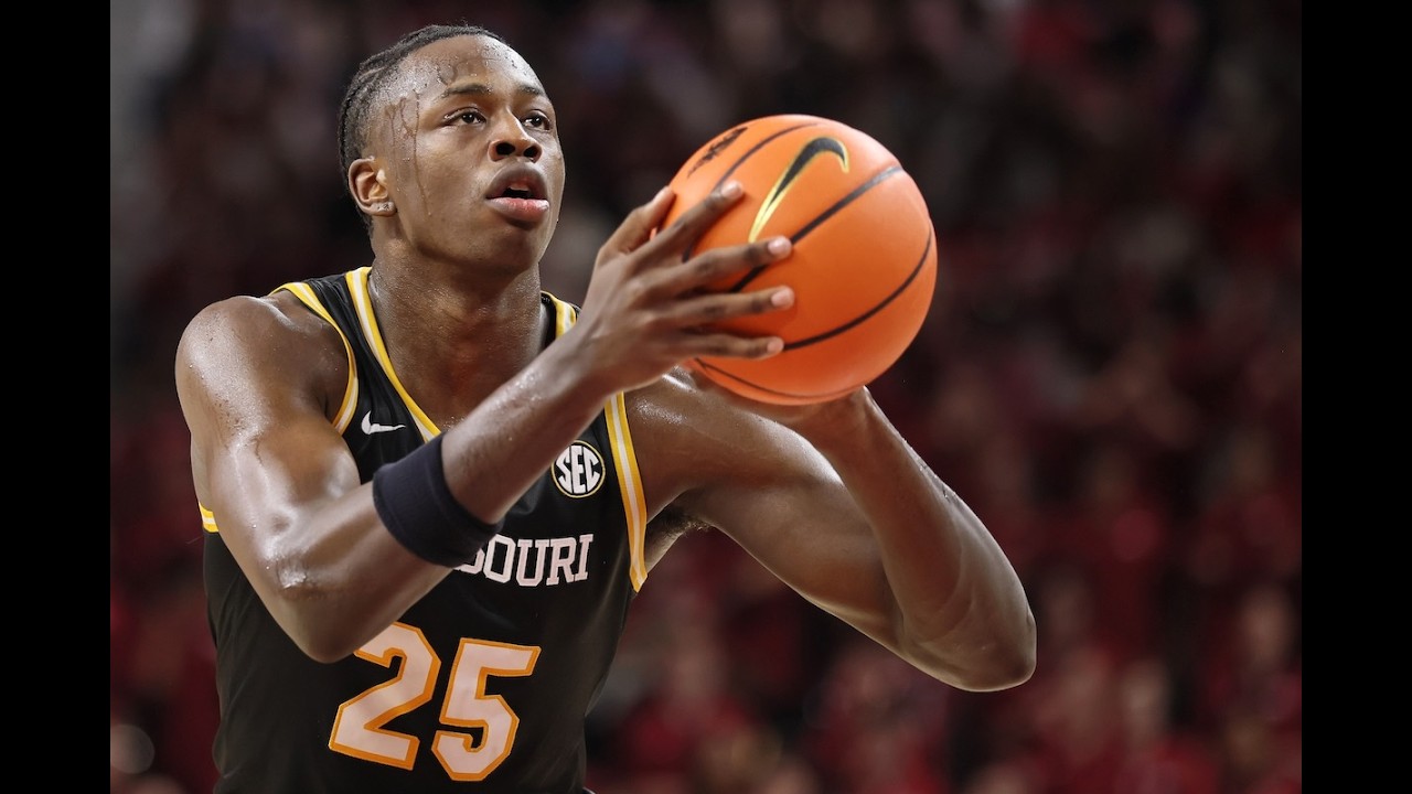 Mizzou forward Mark Mitchell ahead of Arkansas
