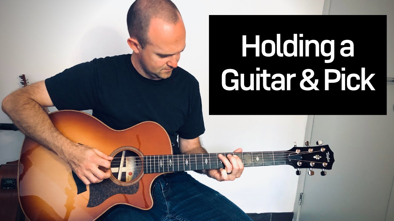 How to hold the guitar and pick THE RIGHT WAY!  Avoid tension and pain in your left hand.