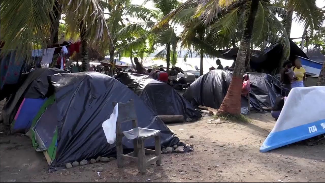 Haitians traveling from South America to US change Colombian coastal town