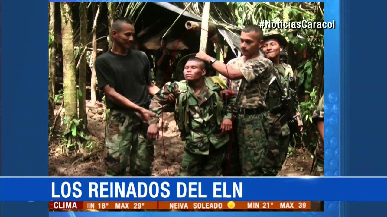 En tanga, brasier y botas de caucho, guerrilleros del ELN celebran reinado