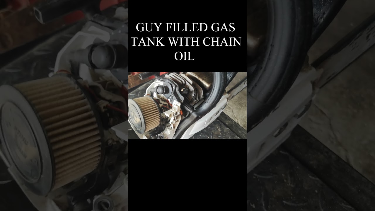 GUY FILLED GAS TANK WITH CHAIN OIL NO GAS 