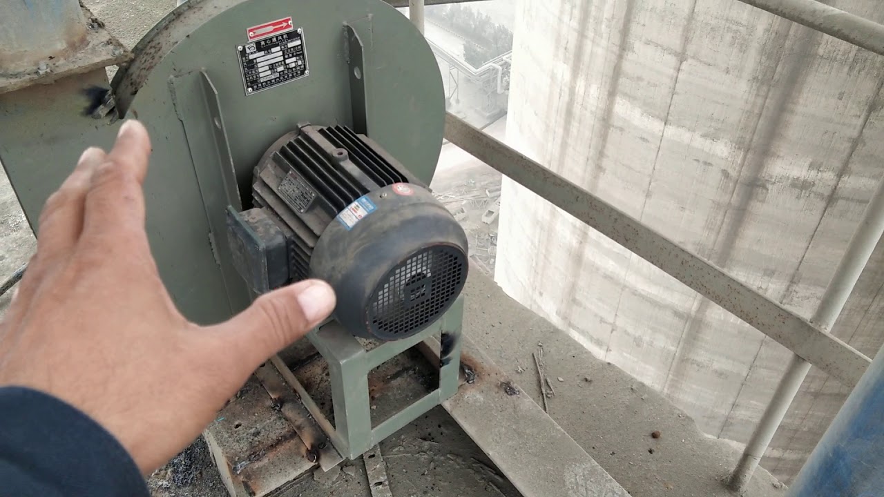Motor trial run in industry. (industry). Fan and motor set trial run in cement industry. Motor run.