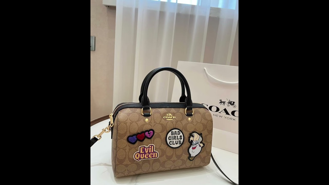 Coach new Boston Disneyland villain badge co-branded handbag